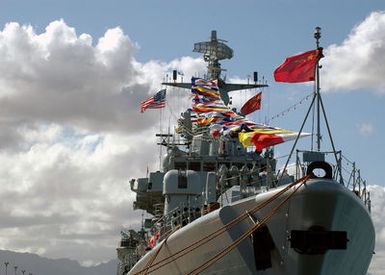 The Chinese Peoples Liberation Army Navy Luhu Class (Type 052) Guided Missile Destroyer QINGDAO (DDG 113) flies the U.S. National ENSIGN and signal flags during a Goodwill Visit at Naval Station Pearl Harbor, Hawaii, on Sept. 7, 2006. The visit provides an excellent opportunity to enhance cooperation between the two navies and underscores the United States commitment to supporting ongoing cooperative efforts in the Pacific Region. (U.S. Navy photo by Mass Communication SPECIALIST 1ST Class James E. Foehl) (Released)