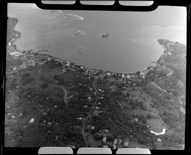 Apia, Upolu, Samoa, showing village and harbour