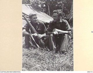 DAGUA, NEW GUINEA. 1945-03-30. PRIVATE J.E. ADLER (1), AND PRIVATE G.M. DALEY (2), D COMPANY 2/2 INFANTRY BATTALION