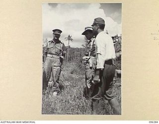 MALAGUNA MISSION, NEW BRITAIN. 1945-09-10. A JAPANESE OFFICER WITH BRIGADIER C.R.V. EDGAR, IN THE MALAGUNA BEACH AREA, SOON AFTER THE OCCUPATION OF RABAUL BY 4 INFANTRY BRIGADE TROOPS