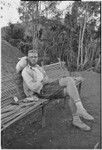 Edwin Cook with pet cockatoo, Marilyn