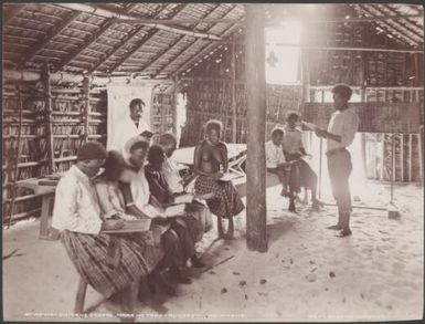 Teachers and students in Dr. Welchman's school at Mara-na-tabu, Solomon Islands, 1906 / J.W. Beattie