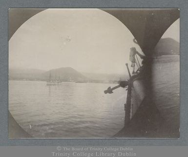 Photograph of Apia Bay, Samoa with a German warship and Mount Vaea in the background