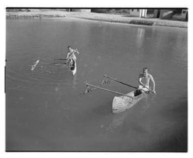 [Negative of Two Soldiers Canoeing]