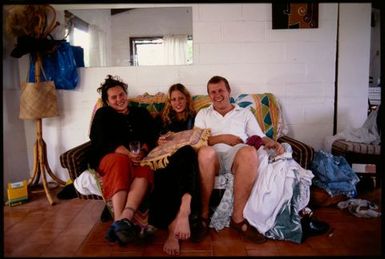 Three people on a sofa, Cook Islands