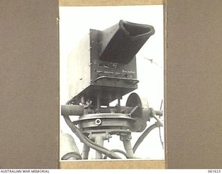 PORT MORESBY, NEW GUINEA. 1943-12-16. CLOSE UP OF THE SIGNAL SELECTOR UNIT OF THE (SEARCHLIGHT CONTROL) SITE TESTING EQUIPMENT AT THE HEAVY ANTI-AIRCRAFT GUN SITE H.8 ROYAL AUSTRALIAN ARTILLERY