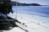 French Polynesia, outrigger canoe on beach in Bora Bora