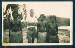 Don Honeysett with three young New Guinean women at beachfront, New Guinea, c1929 to 1932