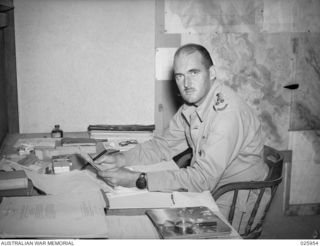 PORT MORESBY, PAPUA, 1942-07. BRIGADIER S.H.W.C. PORTER DSO, COMMANDING 30TH AUSTRALIAN INFANTRY BRIGADE, PHOTOGRAPHED AT HIS HEADQUARTERS