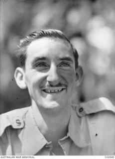 KIRIWINA, TROBRIAND ISLAND, PAPUA. 1944-01-27. PORTRAIT OF WARRANT OFFICER J. E. C. "SHORTY" ARTHUR OF BURNIE, TAS, A PILOT WITH NO. 76 SQUADRON RAAF WHO WAS PICKED UP BY AIR SEA RESCUE AFTER ..