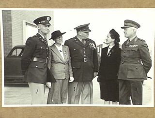 MELBOURNE, AUSTRALIA. 1943-06-03. PRESENTATION OF AMERICAN DISTINGUISHED SERVICE CROSSES (DSC) TO MRS OWEN, (WIFE OF LIEUTENANT COLONEL W. T. OWEN), AND MRS WALKER, (MOTHER OF LIEUTENANT I. ..