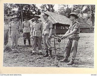 NADZAB AREA, NEW GUINEA, 1945-06-27. HIS ROYAL HIGHNESS, THE DUKE OF GLOUCESTER, GOVERNOR GENERAL OF AUSTRALIA (4), LT P. EDDINGTON (1), BRIG D.S. SCHREIBER, AIDE-DE-CAMP TO THE GOVERNOR GENERAL ..