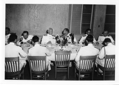 Military personnel at dinner with Admiral Nimitz