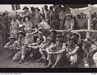 SOPUTA, NEW GUINEA. 1943-10-09. NX8 LIEUTENANT GENERAL SIR LESLIE MORSHEAD KCB KBE CMG DSO ED, GENERAL OFFICER COMMANDING 2ND AUSTRALIAN CORPS (1), AT THE RACE MEETING AND GYMKHANA CONDUCTED BY THE ..