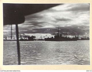 TOROKINA, BOUGAINVILLE, 1945-08-20. THE CORVETTE HMAS LITHGOW, AT ITS MOORINGS IN TOROKINA HARBOUR AFTER RETURNING FROM SURRENDER NEGOTIATIONS WITH THE JAPANESE ENVOY AT SEA, OFF BUIN, SOUTH ..