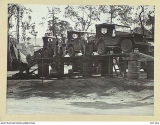 TOROKINA, BOUGAINVILLE. 1945-04-28. ARMY JEEPS ON THE RAMP AT THE TRANSPORT AND LIGHT AID DETACHMENT SECTION ATTACHED HEADQUARTERS 2 CORPS