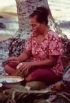 Grating ingredients for vaihu tamoko for fakanoanoa (evening mourning gathering)