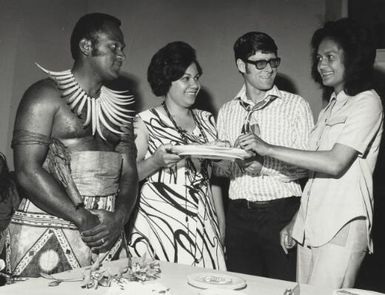 Eparama Ketedromo in national costume, Julie Smith, Peter Schrader and his wife Akesa, attending a meeting, Adelaide, South Australia, 14 October 1972