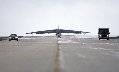 The first of six US Air Force (USAF) B-52 Stratofortress bombers from Minot Air Force Base (AFB), North Dakota (ND) taxis to their parking spaces after landing at Andersen Air Force Base (AFB), Guam (GU) in support of the US Pacific Command's (PACOM) request for a rotational bomber force