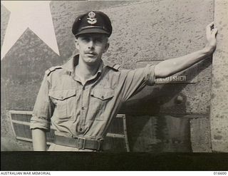 New Guinea. 1944-02-20. RAAF members are now flying American Liberator aircraft operating in New Guinea. Every state except Tasmania is represented in the Liberator crews. Pictured is Pilot Officer ..