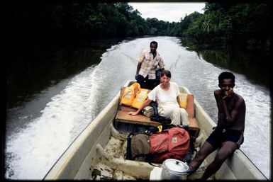 Viv Whitaker +2 on boat on river