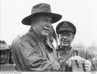 COMPTON RIVER AREA, BOUGAINVILLE. 1945-03-25. GENERAL SIR THOMAS A. BLAMEY, COMMANDER-IN-CHIEF, ALLIED LAND FORCES, SOUTH WEST PACIFIC AREA (1), AND LIEUTENANT-GENERAL S.G. SAVIGE, GENERAL OFFICER ..