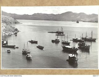 NAPA NAPA, NEW GUINEA. 1943-11-12. SMALL CRAFT STANDING OFF THE 2ST AUSTRALIAN WATERCRAFT WORKSHOPS, AUSTRALIAN ELECTRICAL AND MECHANICAL ENGINEERS