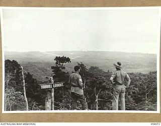 MILNE BAY, NEW GUINEA, 1943-07-12. VIEW FROM TURNBULL'S LOOKOUT, ON THE HILL STATION ROAD. THIS OVERLOOKS "TURNBULL'S" FIGHTER AERODROME AND MILNE BAY