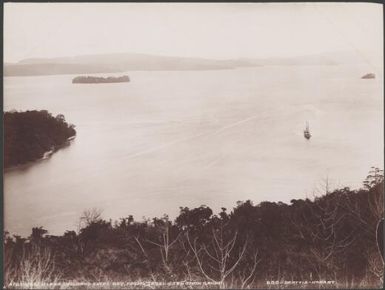 St. Georges Island in Thousand Ships Bay, viewed from Ysabel, Solomon Islands, 1906 / J.W. Beattie