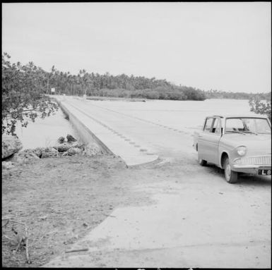 A vehicle parked near a causeway, Fiji, 1966 / Michael Terry