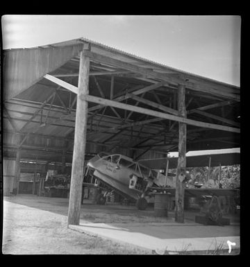 De Havilland Dragon, belonging to Sepik River Trading Company, in hangar, Madang Airfield, Papua New Guinea