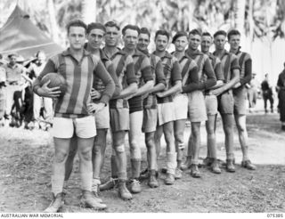 Members of the soccer football team which is to play a team from the HMAS Manoora during the inter unit sports meeting. Identified personnel are: (left to right) QX55029 Signaller (Sig) E H Catton ..