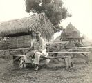 Soldier with dog, Fiji, 1940s