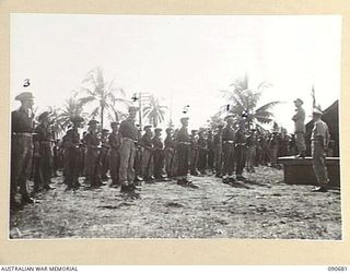 AITAPE, NEW GUINEA. 1945-04-17. MAJOR GENERAL J.E.S. STEVENS, GENERAL OFFICER COMMANDING 6 DIVISION (6) ADDRESSING 2/6 CAVALRY (COMMANDO) REGIMENT TROOPS. THE PARADE WAS HELD IN UNIT LINES SHORTLY ..