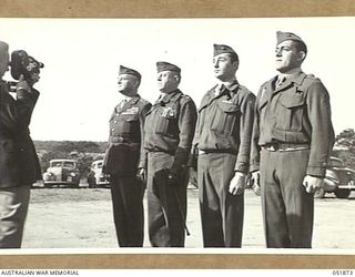 MOUNT MARTHA, VIC. 1943-05-18. FOLLOWING A CEREMONIAL PARADE BY THE SEVENTH U.S. MARINE REGIMENT, THE FOUR HOLDERS OF CONGRESSIONAL MEDALS OF HONOR IN THE FIRST U.S. MARINE DIVISION, POSE FOR ..