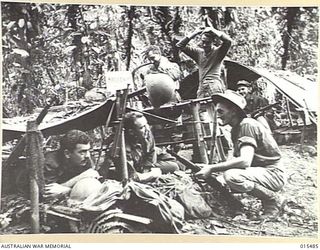 1943-08-10. NEW GUINEA. MOUNT TAMBU FIGHTING. AN ALLIED CAMP ON MOUNT TAMBU SIXTY YARDS FROM THE JAPANESE, AND CHRISTENED "BROADWAY" BY ITS OCCUPANTS. (NEGATIVE BY G. SHORT)