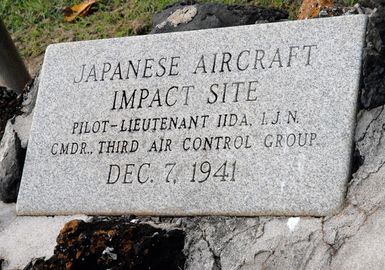 A U.S. Navy monument marks the impact site of Japanese pilot LT. Iida, who crashed during the 1941 attack on Pearl Harbor, Hawaii. Survivors and media took part in a joint U.S. Navy/National Park Service ceremony commemorating the 65th anniversary of the attack on Pearl Harbor, Hawaii, on Dec. 3, 2006. (U.S. Navy PHOTO by Mass Communication SPECIALIST SEAMAN Daniel A. Barker) (Released)