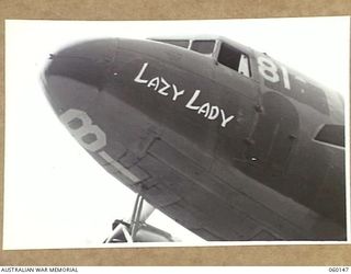 WARD'S DROME, NEW GUINEA. 1943-11-16. LAZY LADY, AN AMERICAN DOUGLAS TRANSPORT AIRCRAFT USED BY THE TROOPS OF THE 2/5TH AUSTRALIAN FIELD REGIMENT, 7TH AUSTRALIAN DIVISION, DURING AN EXPERIMENTAL ..