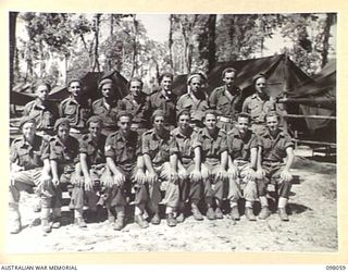 TOROKINA, BOUGAINVILLE, 1945-10-15. THE SIGNAL SECTION, U HEAVY BATTERY. (FOR IDENTIFICATION OF 17 NAMED PERSONNEL REFER TO PROVISIONAL CAPTION OR NAME INDEX.)