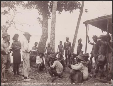 Bishop Wilson reading the governors despatch to local people at Ahia, Solomon Islands, 1906, 2 / J.W. Beattie