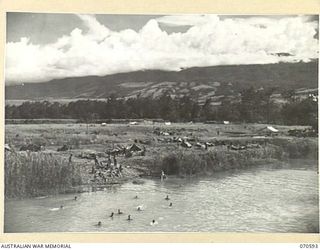 DALLMAN RIVER, NEW GUINEA, 1944-02-21. "SHANTY TOWN", CAMP SITE OF THE 30TH INFANTRY BATTALION RESTING AT THE DALLMAN RIVER