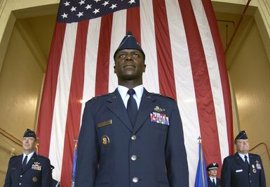 U. S. Air Force Commander of 13th Air Force MAJ. GEN. Edward A. Rice stands at attention during the 13 Air Force Change of Command ceremony at Anderson Air Force Base, Guam, on Jan. 25, 2005. (U. S. Air Force PHOTO by STAFF SGT. Bennie J. Davis III) (Released)