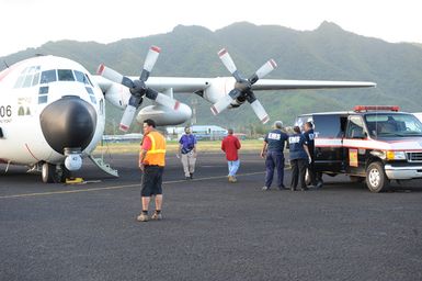 Earthquake ^ Tsunami - Pago Pago, American Samoa, October 5, 2009 -- A Coast Guard plane that is evacuating an infant to Hawaii prepares to leave American Samoa. The Disaster Medical Assistance Team (DMAT) deployed to American Samoa assisted with the evacuation. DMATs are part of the U. S. Department of Health and Human Services' National Disaster Medical System which supports hospitals and other medical and public health needs of communities during disasters such as the earthquake and tsunami disaster in American Samoa. FEMA/Casey Deshong