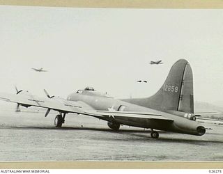 PAPUA. 1942-08-19. AMERICAN BOMBER AND FIGHTER PLANES TAKING OFF FROM AN AERODROME
