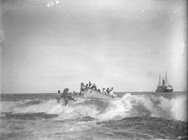 Mauke Is. Landing on the reef in big surf. (South Sea Islands cruise)