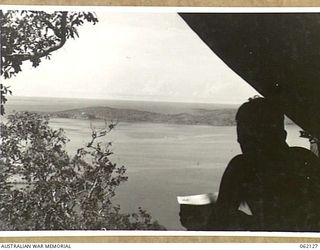 PORT MORESBY, NEW GUINEA. 1943-12-29. LOOKING OUT ON THE BAY