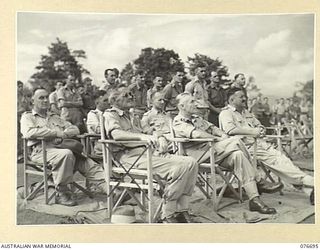 LAE, NEW GUINEA. 1944-11-05. SENIOR AUSTRALIAN ARMY OFFICERS ATTENDING THE SOLEMN REQUIEM MASS AT THE LAE WAR CEMETERY CELEBRATED BY THE ASSISTANT CHAPLAIN GENERAL (ROMAN CATHOLIC), HEADQUARTERS, ..