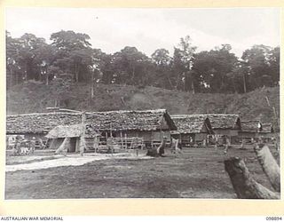 PIEDU ISLAND, SOLOMON ISLANDS. 1945-11-13. A GENERAL VIEW OF JAPANESE AREA 12 WITH ONE OF THE MANY WELLS IN THE FOREGROUND. JAPANESE CONCENTRATED ON THE ISLAND ARE UNDER THE CONTROL OF 7 INFANTRY ..