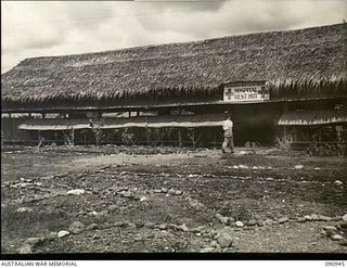 Lae, New Guinea. 1945-04-29. Exterior view of the Red Cross recreation hut at the 2/7th Australian General Hospital