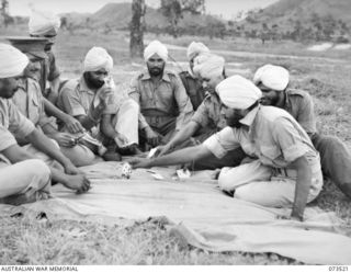 PORT MORESBY, NEW GUINEA. 1944-05-31. SOME OF THE 66 MEMBERS OF THE 5/11TH SIKH REGIMENT WHO WERE LIBERATED BY AMERICAN FORCED IN THE ADMIRALTY ISLANDS. THEY HAD BEEN CAPTURED BY THE JAPANESE AT ..